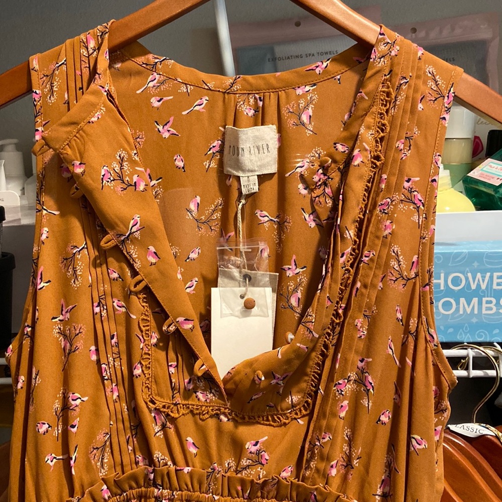 Orange rust dress with pink bird design